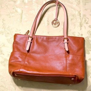 Michael Kors leather shoulder purse. Dark buckskin leather with tan straps